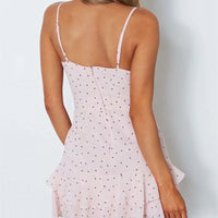 Kurzes Damenkleid mit Tupfenmuster und Rüschen im Cross-Over-Stil - Abril