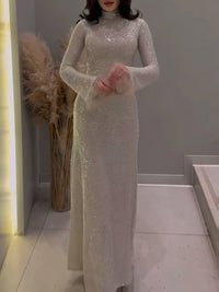 Fenra - Robe à paillettes et plumes cousues