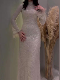 Fenra - Robe à paillettes et plumes cousues