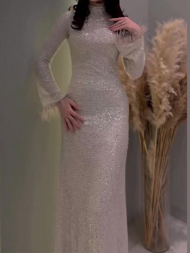 Fenra - Robe à paillettes et plumes cousues