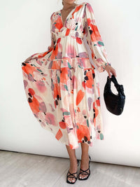 Elvena - Robe midi élégante en mousseline de soie fleurie