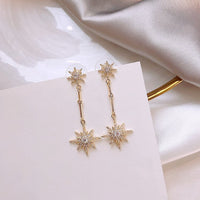 Boucles d'oreilles longues en cristal étoilé